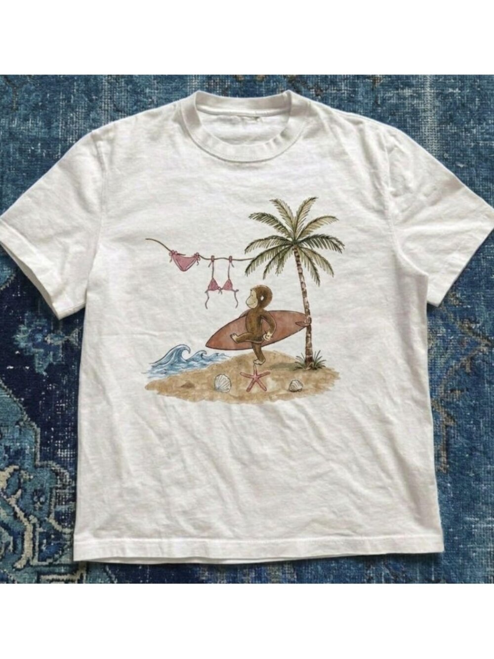 White Curious George Surfing Monkey graphic t-shirt